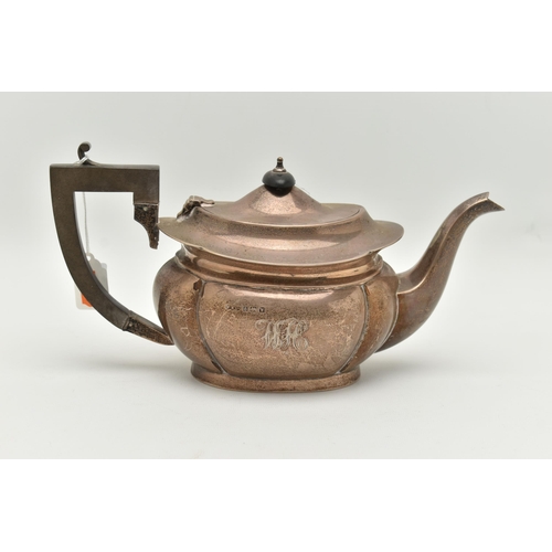 103 - AN EARLY 20TH CENTURY SILVER TEAPOT, polished wavy form, engraved monogram, hinged cover, fitted wit... 