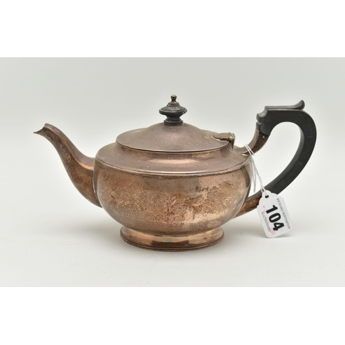 104 - AN 'ELKINGTON & CO' SILVER TEAPOT, polished form with engraved monogram, fitted with an ebonised han... 