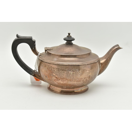 104 - AN 'ELKINGTON & CO' SILVER TEAPOT, polished form with engraved monogram, fitted with an ebonised han... 