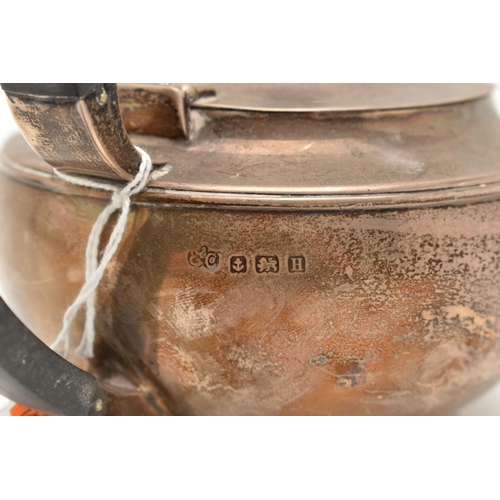 104 - AN 'ELKINGTON & CO' SILVER TEAPOT, polished form with engraved monogram, fitted with an ebonised han... 