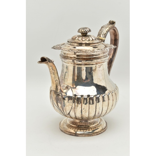 106 - A GEORGE IV SILVER PEDESTAL COFFEE POT, the knopped finial with ivory insulator, reeded hinged lid a... 