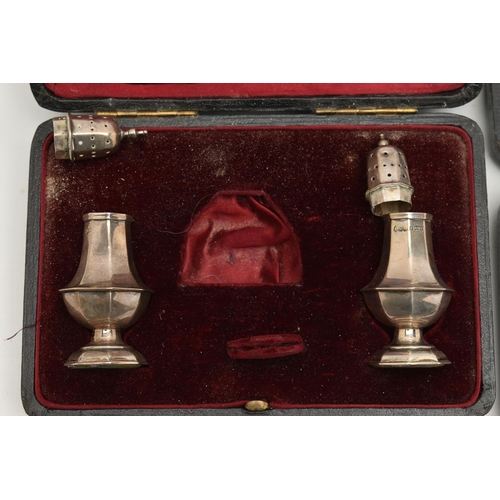 108 - THREE CASED SETS OF SILVER ITEMS, to include a cased Victorian fork and spoon travel set, thistle pa... 