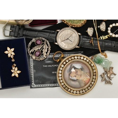 114 - A SELECTION OF COSTUME JEWELLERY, to include brooches, pendants, a watch, earrings, cufflinks, charm... 