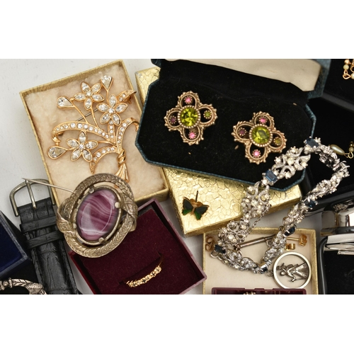 114 - A SELECTION OF COSTUME JEWELLERY, to include brooches, pendants, a watch, earrings, cufflinks, charm... 