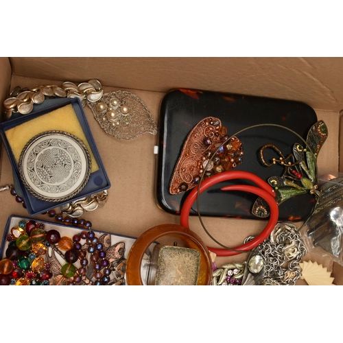 131 - A LARGE BOX OF ASSORTED COSTUME JEWELLERY, to include a rolled gold buckle bangle, a coral gold plat... 