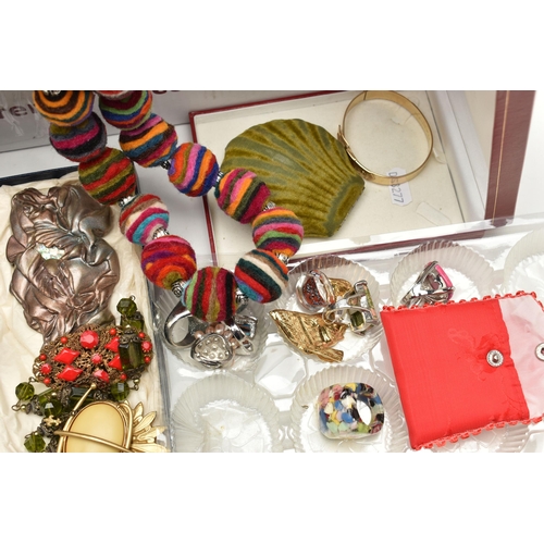 131 - A LARGE BOX OF ASSORTED COSTUME JEWELLERY, to include a rolled gold buckle bangle, a coral gold plat... 