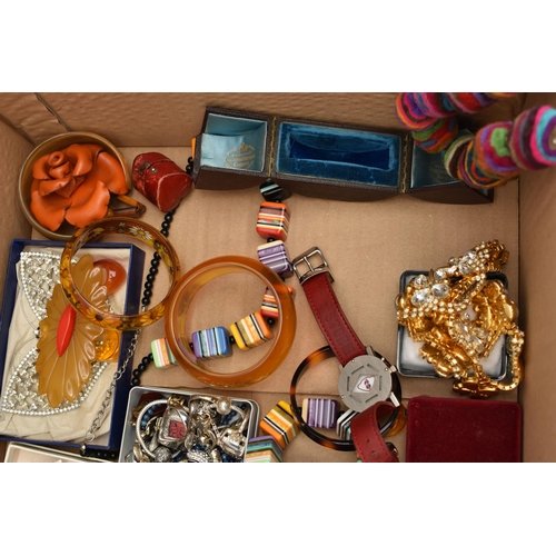 131 - A LARGE BOX OF ASSORTED COSTUME JEWELLERY, to include a rolled gold buckle bangle, a coral gold plat... 