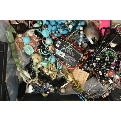 136 - A PLASTIC STORAGE BOX WITH A LARGE ASSORTMENT OF COSTUME JEWELLERY, to include beaded necklaces, ban... 