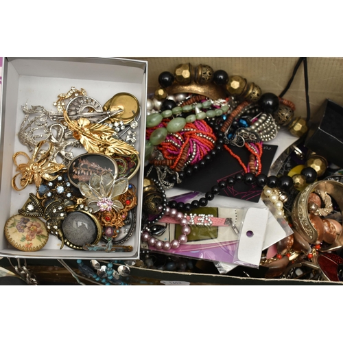 136 - A PLASTIC STORAGE BOX WITH A LARGE ASSORTMENT OF COSTUME JEWELLERY, to include beaded necklaces, ban... 