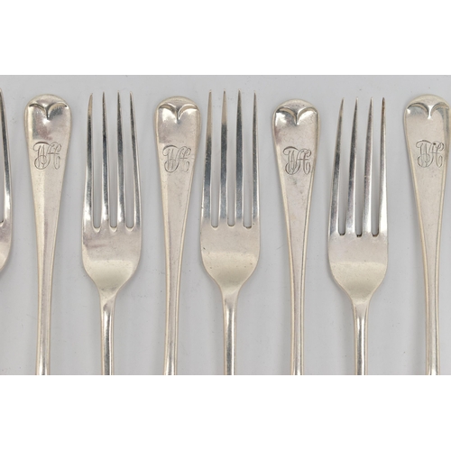 87 - A SET OF TWELVE SILVER FORKS, old English pattern forks each with engraved initials to the terminals... 