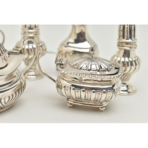 90 - A GROUP OF LATE 19TH AND 2OTH CENTURY SILVER CRUET ITEMS, comprising a pair of lobed baluster pepper... 