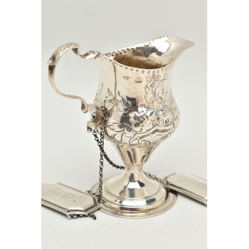 93 - A GEORGE III SILVER BALUSTER CREAM JUG AND A PAIR OF EDWARDIAN SILVER DECANTER LABELS, the cream jug... 