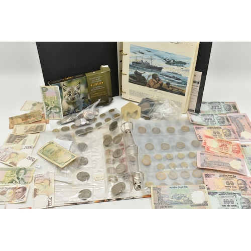 145 - A PLASTIC STORAGE TUB CONTAINING COINS AND BANKNOTES, to include an album of 'The History Of World W... 