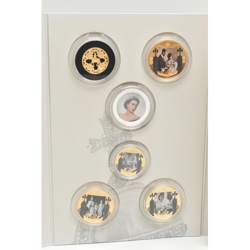 149 - THE LONDON MINT OFFICE 12X ELIZABETH II ALBUM, to include 10X gold layered coins of Elizabeths life,... 