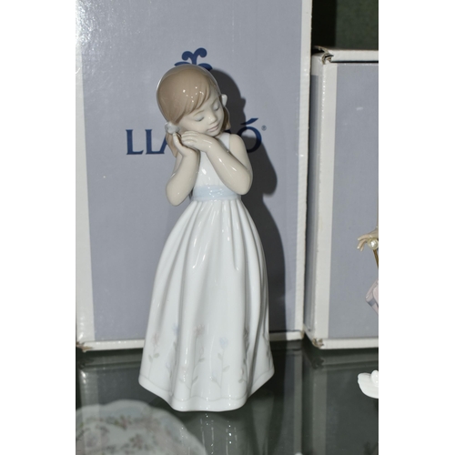 382 - A GROUP OF LLADRO AND NAO FIGURES, comprising Lladro: An Elegant Touch no 6862, sculptor Jose Santae... 