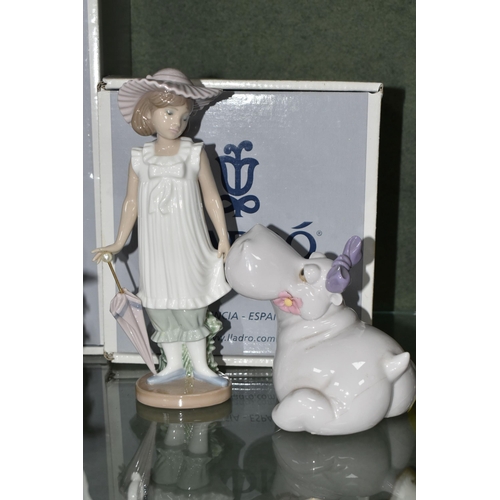 382 - A GROUP OF LLADRO AND NAO FIGURES, comprising Lladro: An Elegant Touch no 6862, sculptor Jose Santae... 