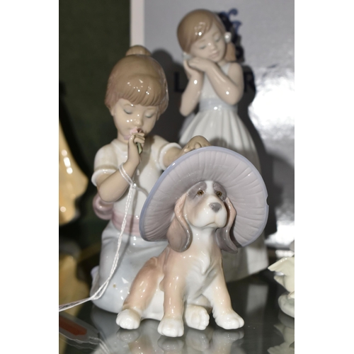 382 - A GROUP OF LLADRO AND NAO FIGURES, comprising Lladro: An Elegant Touch no 6862, sculptor Jose Santae... 