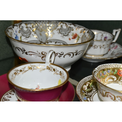 386 - A COLLECTION OF NINETEENTH CENTURY TEA WARE, all hand painted with sprays of flowers, comprising six... 