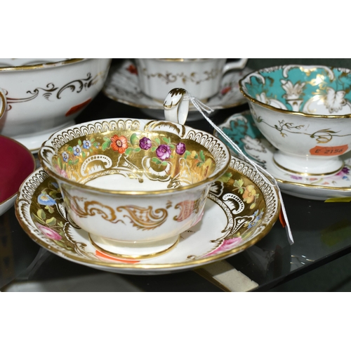 386 - A COLLECTION OF NINETEENTH CENTURY TEA WARE, all hand painted with sprays of flowers, comprising six... 