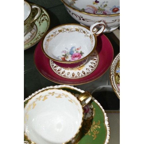 386 - A COLLECTION OF NINETEENTH CENTURY TEA WARE, all hand painted with sprays of flowers, comprising six... 