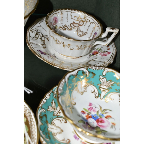 386 - A COLLECTION OF NINETEENTH CENTURY TEA WARE, all hand painted with sprays of flowers, comprising six... 