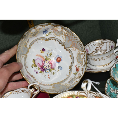 386 - A COLLECTION OF NINETEENTH CENTURY TEA WARE, all hand painted with sprays of flowers, comprising six... 