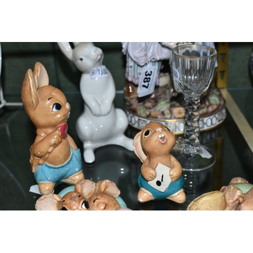 387 - A GROUP OF CERAMIC FIGURES, PENDELFIN RABBITS AND GLASSWARE, comprising a porcelain figure group, de... 