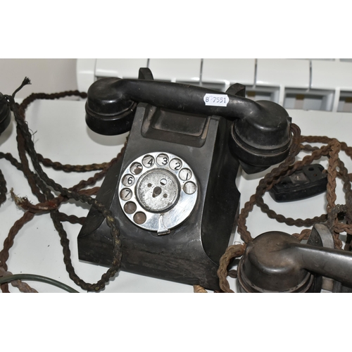 392 - FIVE BAKELITE VINTAGE TELEPHONES to include four ATM L11560.C7 table telephones in black with origin... 