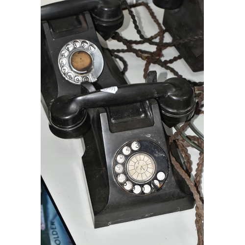 392 - FIVE BAKELITE VINTAGE TELEPHONES to include four ATM L11560.C7 table telephones in black with origin... 