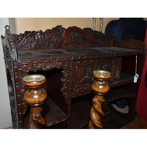 405 - AN ORIENTAL CARVED WALL DISPLAY CABINET,  carved dark wood cabinet, decorated with a prunus blossom ... 