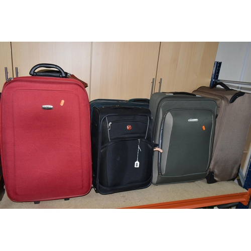 406 - A GROUP OF SIX SUITCASES, fabric, soft shell suitcases, two wheeled, comprising a brown Antler, a gr... 