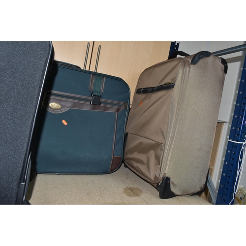 406 - A GROUP OF SIX SUITCASES, fabric, soft shell suitcases, two wheeled, comprising a brown Antler, a gr... 