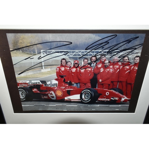 419 - TWO FRAMED PHOTOGRAPHS featuring Concorde, signed by Captain and Crew and a signed Racing Car photog... 