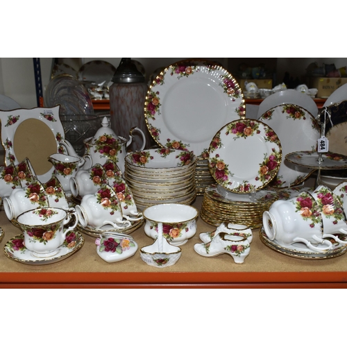 484 - A SIXTY NINE PIECE ROYAL ALBERT 'OLD COUNTRY ROSES' DINNER SERVICE WITH SEVEN PIECES OF GIFTWARE, co... 