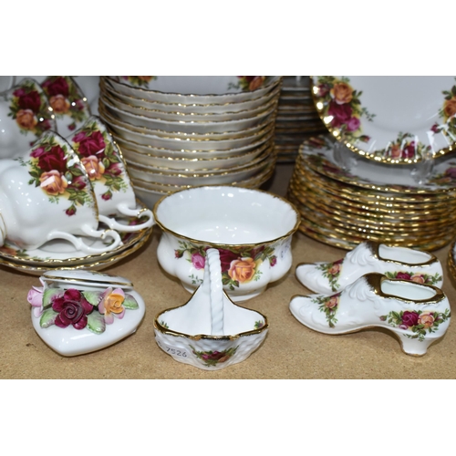 484 - A SIXTY NINE PIECE ROYAL ALBERT 'OLD COUNTRY ROSES' DINNER SERVICE WITH SEVEN PIECES OF GIFTWARE, co... 