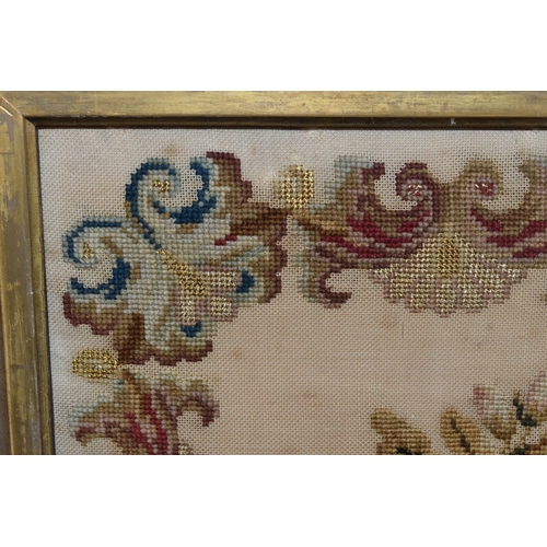 503 - TWO 19TH CENTURY NEEDLEWORK PICTURES, the first a tapestry worked in wool depicting two exotic birds... 