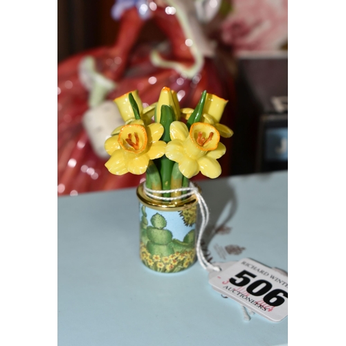 506 - A GROUP OF CERAMICS, comprising a boxed Halcyon Days 'Daffodils' enamel vase, containing a bunch of ... 