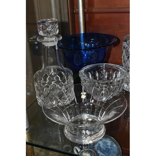 510 - A GROUP OF ORREFORS GLASSWARE, comprising a blue bowl with green foot, a decanter with a pair of co-... 