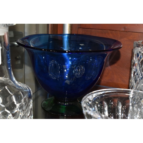 510 - A GROUP OF ORREFORS GLASSWARE, comprising a blue bowl with green foot, a decanter with a pair of co-... 