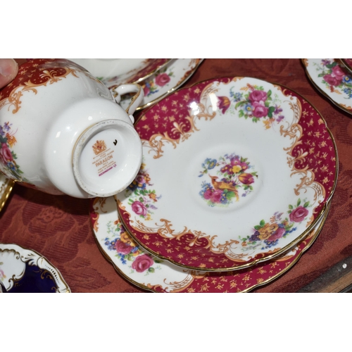 521 - A TWENTY TWO PIECE PARAGON 'ROCKINGHAM' PATTERN PART TEA SET, comprising a cake plate, two cream jug... 