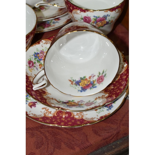 521 - A TWENTY TWO PIECE PARAGON 'ROCKINGHAM' PATTERN PART TEA SET, comprising a cake plate, two cream jug... 