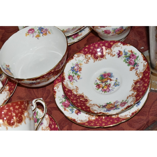 521 - A TWENTY TWO PIECE PARAGON 'ROCKINGHAM' PATTERN PART TEA SET, comprising a cake plate, two cream jug... 