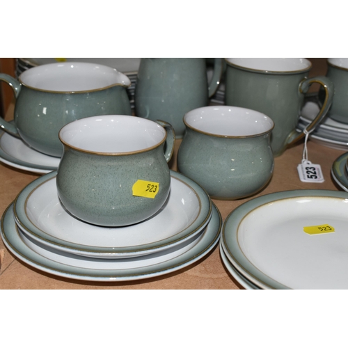 523 - A DENBY 'REGENCY GREEN' DINNER SET with six dinner plates, six tea plates, six bowls, four cups with... 