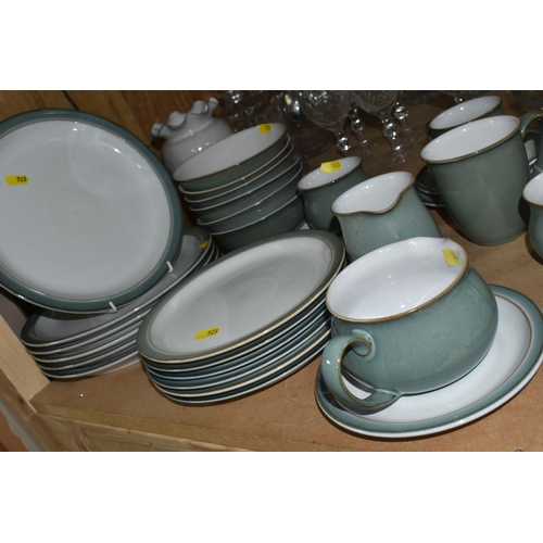 523 - A DENBY 'REGENCY GREEN' DINNER SET with six dinner plates, six tea plates, six bowls, four cups with... 