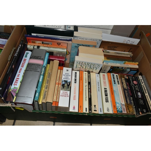 526 - SEVEN BOXES OF BOOKS to include a large quantity of 'Sharpe' novels, a selection of historical ficti... 