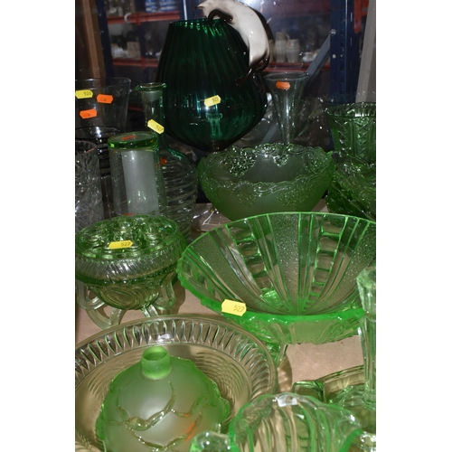 527 - A LARGE QUANTITY OF GREEN GLASSWARE to include assorted bowls and dishes, vases, candlesticks, trays... 