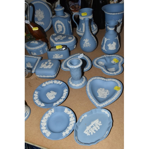 536 - A WIDE ASSORTMENT OF BLUE WEDGWOOD JASPERWARE to include various trinket trays, jugs, bud vases, a t... 