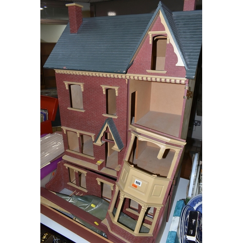 555 - A LARGE MODERN WOODEN DOLLS HOUSE, modelled as a Victorian villa, a Sid Cooke kit which has been con... 