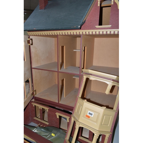 555 - A LARGE MODERN WOODEN DOLLS HOUSE, modelled as a Victorian villa, a Sid Cooke kit which has been con... 