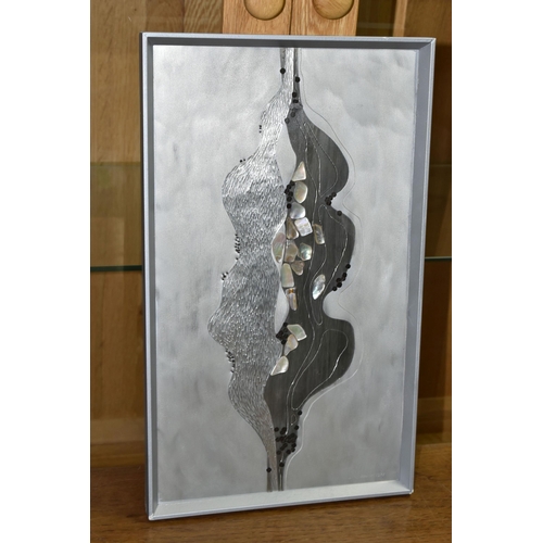 562 - BARRY BRETTELL (CONTEMPORARY) A VINTAGE MIXED MEDIA WALL PLAQUE, the abstract design is composed fro... 